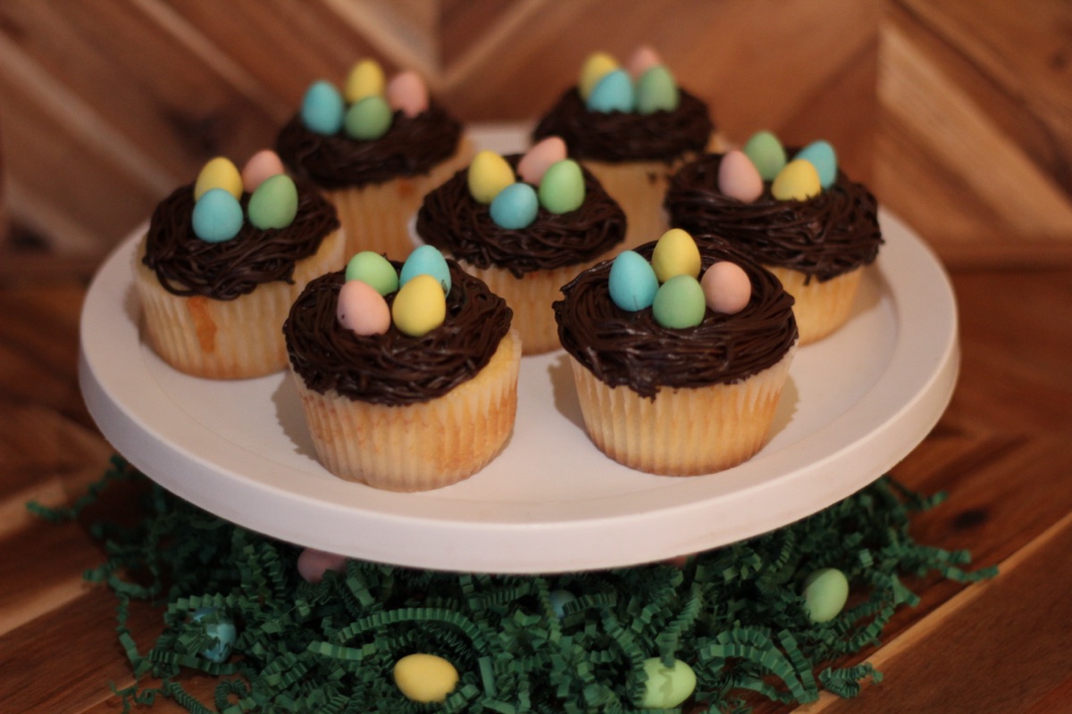 Bird's nest cupcakes with pastel candy eggs